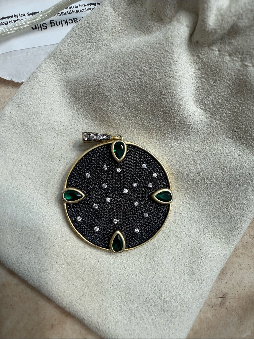 Gold-Tone Black Disc Pendant Necklace with Emerald Accents